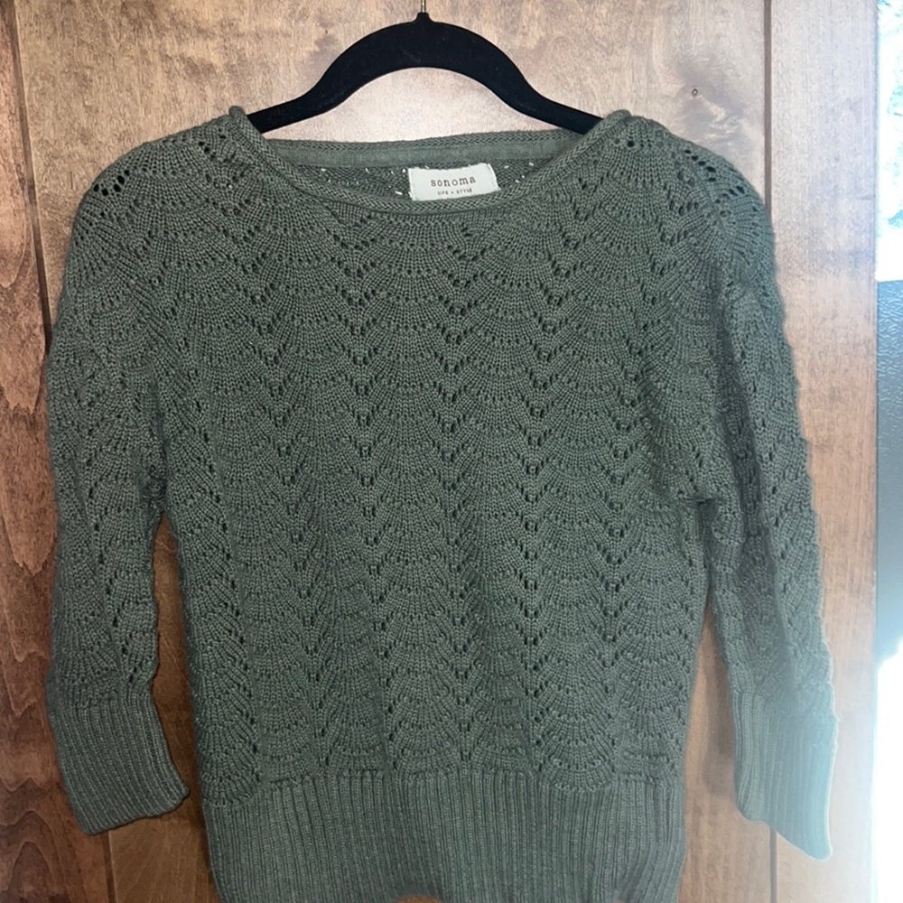 Green crew neck open-knit sweater